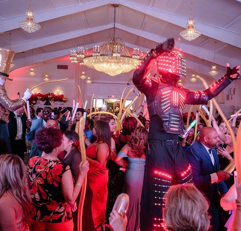 Guests on the dance floor with a live performer